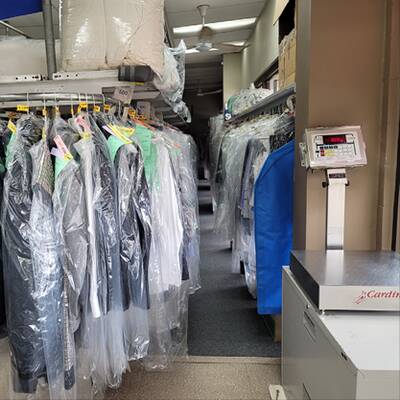 UNATTENDED COIN LAUNDROMAT AND DRY CLEANING PLANT WITH PROPERTY