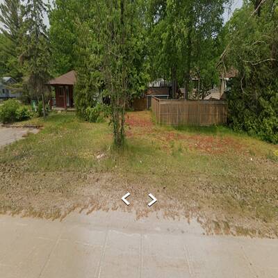 Commercial store with residential unit and vacant land